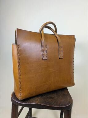 1990's exaggerated stitch large leather hold all top handle bag